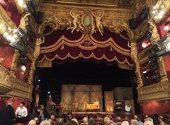 Interior of the Palais-Royal Theatre in Paris with rows of seats and ornate ceiling