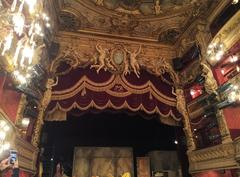 Interior of Palais-Royal Theatre in Paris with audience and stage
