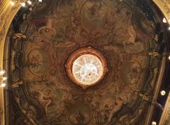 Interior of the Palais-Royal Theatre in Paris with ornate balconies and chandeliers