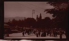 Members of the World Sunday School Association children's parade walking along Lake Zurich with Zurich's Tonhalle towers in the background, 1913