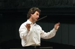 Heiko Mathias Förster conducting Neue Philharmonie Westfalen in rehearsal at Tonhalle Zurich