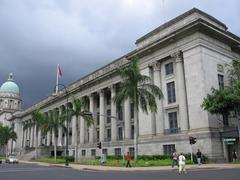 City Hall building in Singapore with modern sky and palm trees