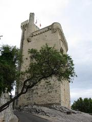 Medieval stone tower Tour Philippe le Bel in Villeneuve-lès-Avignon under blue sky