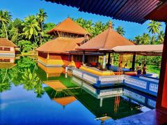 The historic Sree Ananthapadmanabha Swamy Vishnu temple situated inside a large square water tank in Kumbla, Kerala with traditional architecture