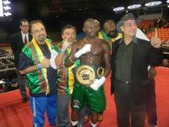 Newly crowned IBO International middleweight champion Osumanu Adama with his manager Wasfi Tolaymat in the boxing ring at UIC Pavilion Chicago December 2010
