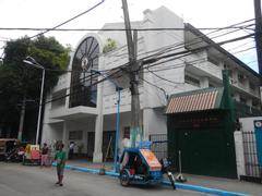 Manuel L. Quezon University campus buildings on Hidalgo Street in Quiapo, Manila