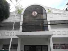 Front entrance of Manuel L. Quezon University building on Hidalgo Street in Quiapo, Manila