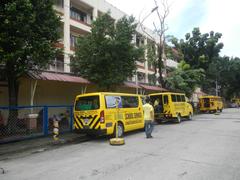 Santo Domingo Avenue near Angelicum College and Santo Domingo Church in Quezon City with street view and vehicles