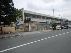 Santo Domingo Avenue view from Gregorio Araneta Avenue corner in Quezon City featuring Angelicum College and Santo Domingo Church