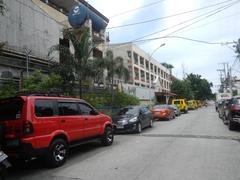 Santo Domingo Avenue at corner of Gregorio Araneta Avenue in Quezon City with Angelicum College and Santo Domingo Church visible