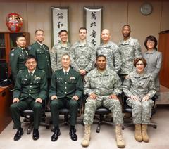 Brigadier General Patrick Sargent meeting with Japan's Medical Director Maj. Gen. Satoshi Suzuki and staff in Ichigaya Japan