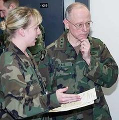 Lt. Gen. James B. Peake receiving briefing on Soldier Readiness Center immunization program at Fort McCoy
