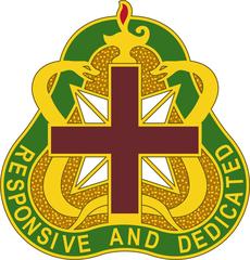 US Army Medical Command Distinctive Unit Insignia badge with green cross and gold serpent emblem