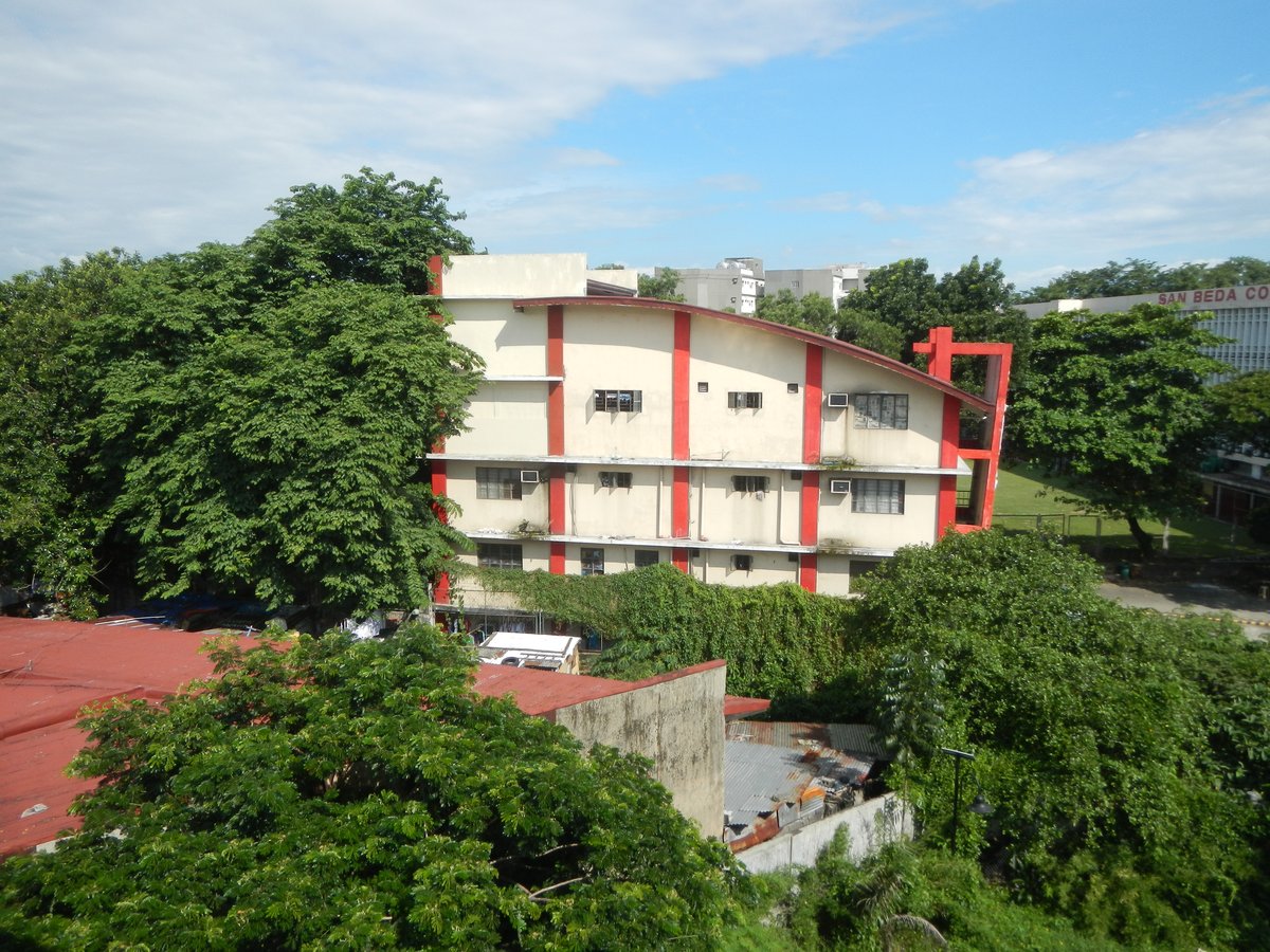 San Beda College building viewed from pedestrian footbridge over Doroteo Jose and Recto LRT stations in Santa Cruz, Manila