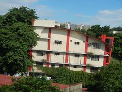 San Beda College building with Manila MRT Line 2 and LRT 1 pedestrian footbridge in Santa Cruz, Manila