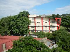San Beda College campus view along Manila MRT Line 2 and LRT 1 pedestrian footbridge in Santa Cruz, Manila