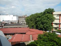 San Beda College near pedestrian footbridge and Manila MRT Line 2-LRT 1 stations in Santa Cruz, Manila