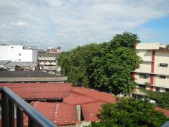 San Beda College building near pedestrian footbridge connecting Manila MRT Line 2 and LRT 1 stations in Santa Cruz, Manila