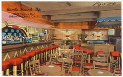 Exterior view of Rand's Round Up restaurant at 13920 Ventura Blvd., Sherman Oaks, California, vintage postcard
