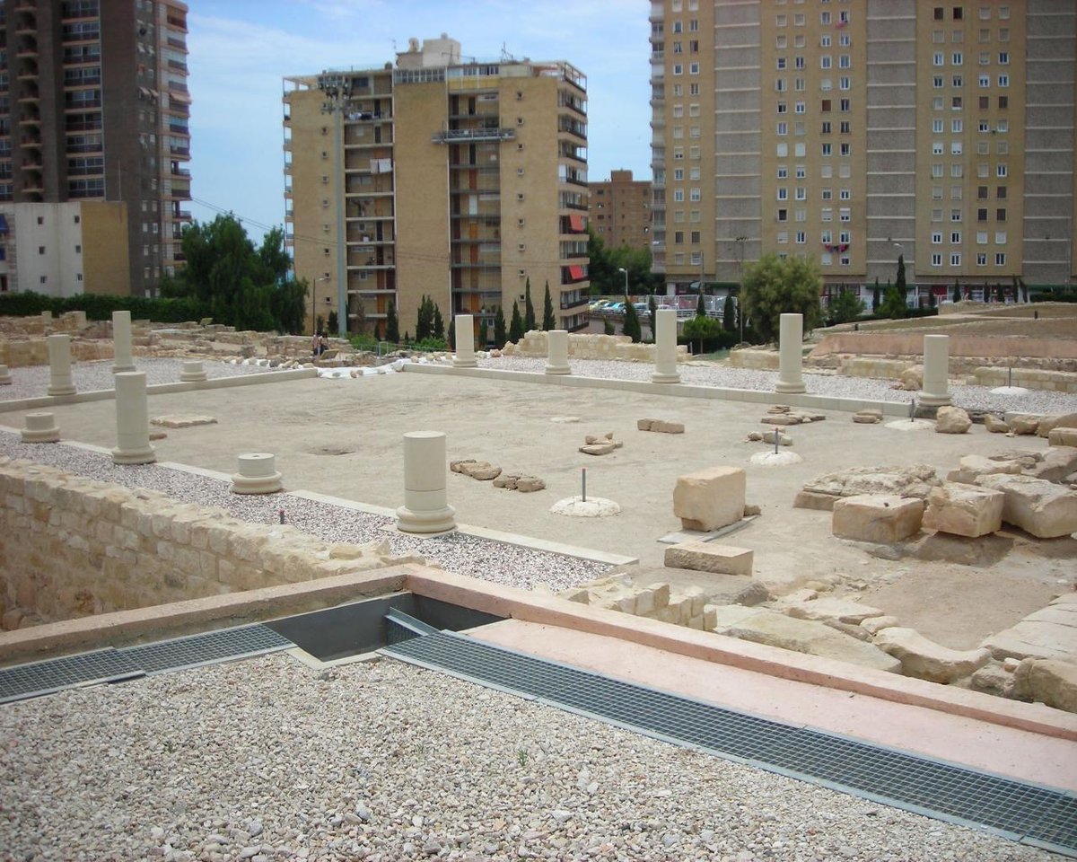 Ruins of Lucentum Forum with stone pillars and archaeological remains