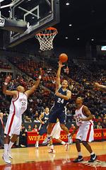 U.S. Navy Midshipman Kaleo Kina making a lay-up basket in basketball game against San Diego State University Aztecs
