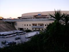 Viejas Arena in former Aztec Bowl stadium showing concrete bleachers and cobblestone walls