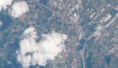 Aerial view of Villa Reale di Marlia park, Casa della Salute hospital in Capannori, Gardens of Villa Grabau, road Via di Matraia, Torrente Fraga tributary to river Serchio in Saltocchio, Lucca, Italy from ISS Expedition 65
