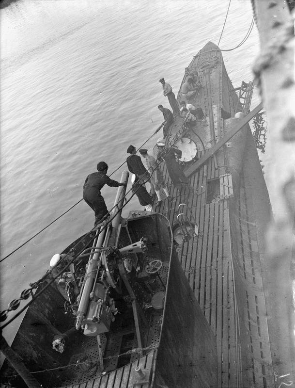 Painting the guns on board the Greek submarine Papanicolis during 1942 in Beirut