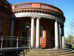 Entrance to Whitworth Gallery with architectural details and greenery