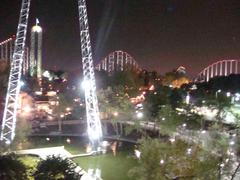 Worlds of Fun amusement park illuminated at night with colorful lights