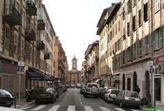 Rue Bavastro in Nice as seen from the port area with buildings and street activity