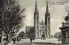 View of Place des Carmes square and Sainte-Baudile church in Nîmes, France