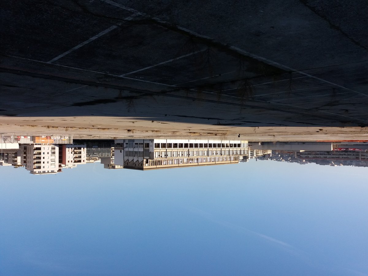 Construction site Pré Gaudry in Lyon with distant view of Saint-Irénée Church