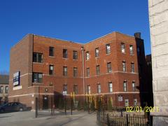St. Hedwig Convent East Side facade with brick exterior and crosses on top in 2011