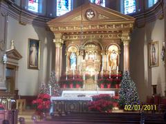 Main altar of St. Hedwig Church in Chicago with intricate religious decorations