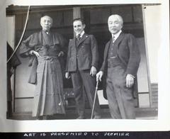 Albert Menasco in his aircraft during aviation exhibition trip to Asia with Art Smith