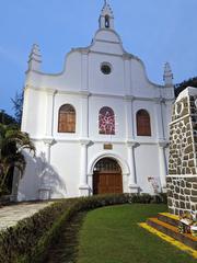 Front view of the Church of St Anthony of Lisbon with statues on top and clear sky