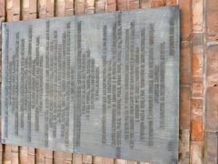 Military academy commemorative plaque in a historic building with columns