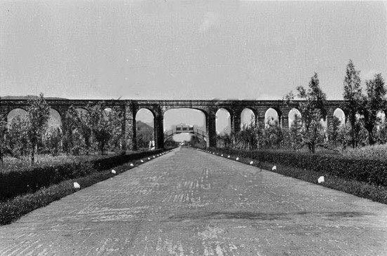 Historic Aqueduct of Nottolini in Lucca between 1928 and 1944 with reconstructed arch and before WWII destruction