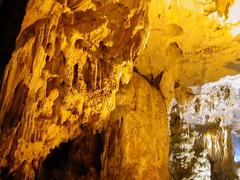 Cave in Ha Long Bay with sunlight illuminating the rocky interior in August 2003
