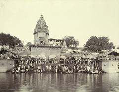 Historic view of Dashashvamedha Ghat on the River Ganges in Varanasi with pilgrims and priests in 1883