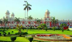 Front view of Charbagh Railway Station in Lucknow with busy platforms and railway tracks