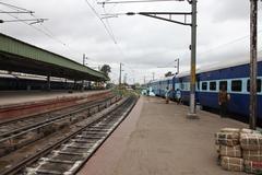 Bangalore City Station bustling with trains and passengers