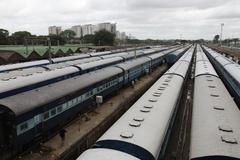 Bangalore City Railway Station with trains and overhead wires