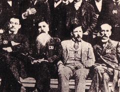 Historic photo of Guillermo Leguizamon, Marcelo T. de Alvear, Leandro N. Alem, Francisco A. Barroetaveña and Juan Passe seated together