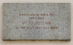 Commemorative plaque for Arturo Toscanini on the facade of 17th century Palazzo Toscanini in Milan