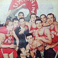 Simmenthal Milano basketball team celebrating championship victory in locker room around coach Cesare Rubini