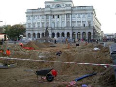 Staszica Palace in Warsaw with workers in the foreground