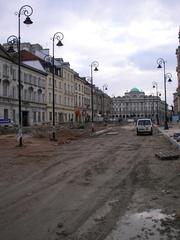 Rebuilding of Krakowskie Przedmieście Street in Warsaw with construction equipment and workers