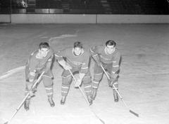 Montreal Canadiens hockey players Maurice Richard, Elmer Lach, and Tony Demers on the ice at the Forum